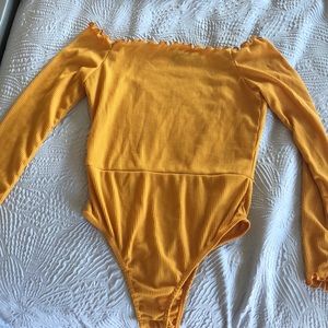 Off the shoulder body suit